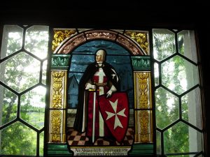vetrata medievale con cavaliere